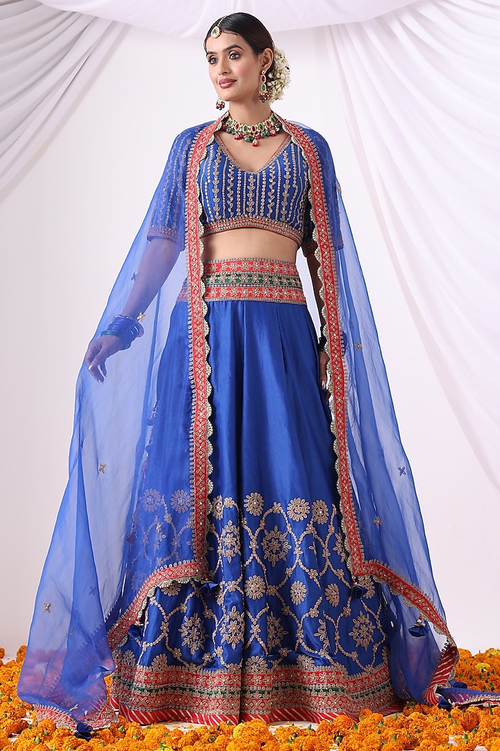 Warm Blue Banarasi Chanderi Zari Embroidered Wedding Lehenga Set by Nia By Sonia Ahuja at Pernia's Pop Up Shop