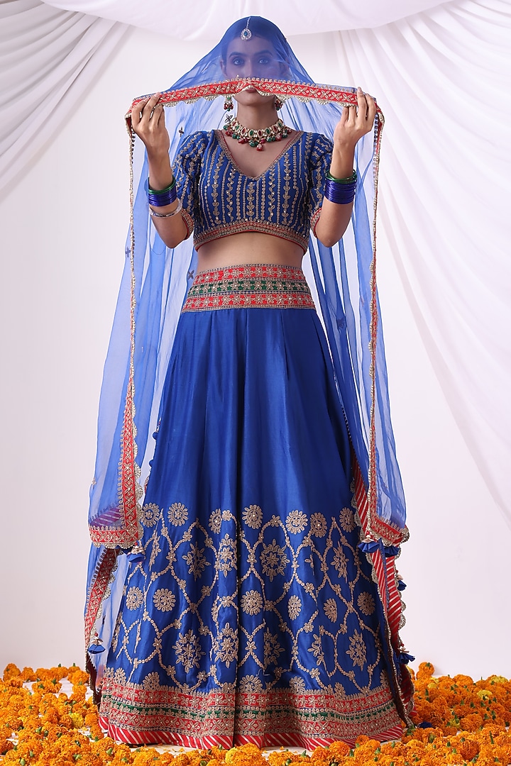 Warm Blue Banarasi Chanderi Zari Embroidered Wedding Lehenga Set by Nia By Sonia Ahuja at Pernia's Pop Up Shop