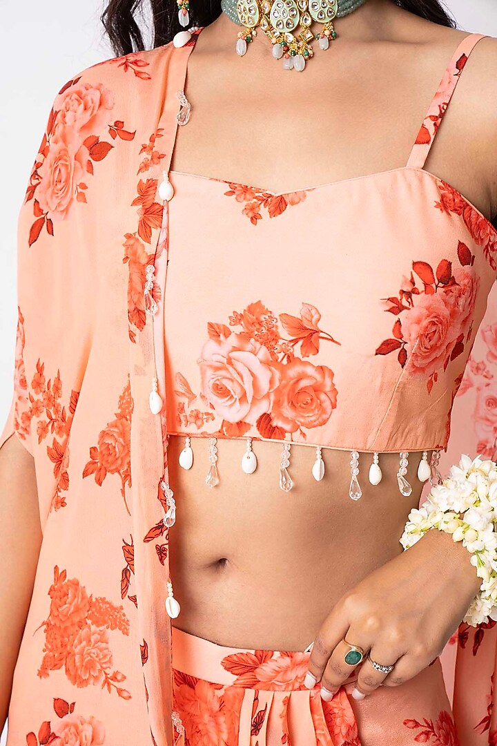Peach Crepe Printed Draped Skirt Set by Nia By Sonia Ahuja at Pernia's Pop Up Shop