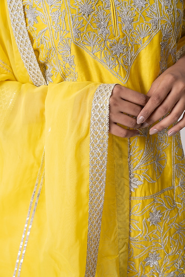 Yellow Banarasi Katan Nakshi Gota Embellished Gharara Set by Nia By Sonia Ahuja at Pernia's Pop Up Shop