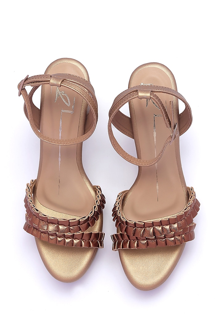 Antique Gold Faux Leather Block Heels by NIDHI BHANDARI at Pernia's Pop Up Shop