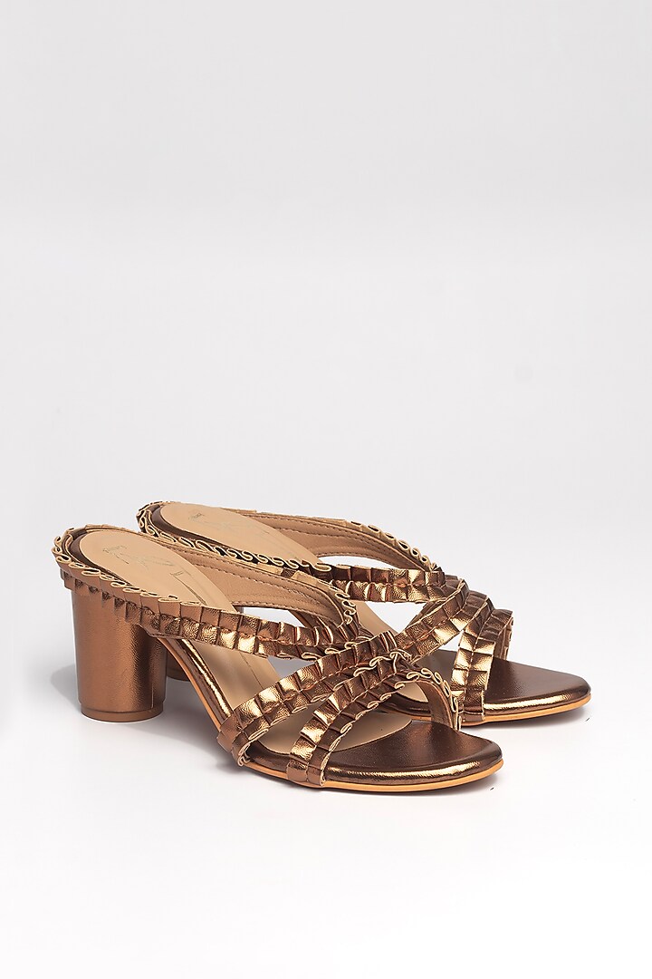 Antique Gold Faux Leather Block Heels by NIDHI BHANDARI at Pernia's Pop Up Shop