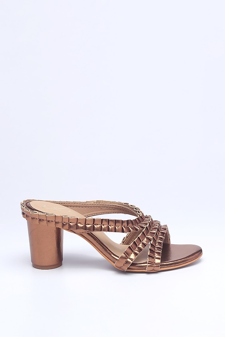 Antique Gold Faux Leather Block Heels by NIDHI BHANDARI at Pernia's Pop Up Shop