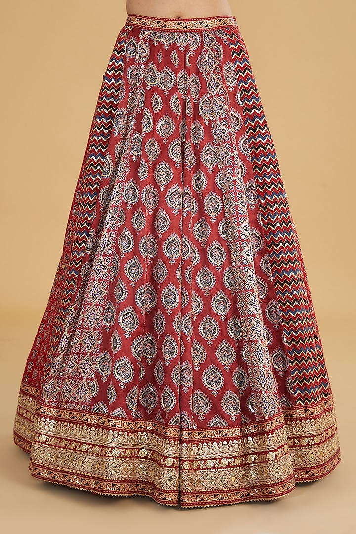 Maroon Modal Silk Ajrakh Printed & Embroidered Bridal Lehenga Set by Nitya Bajaj at Pernia's Pop Up Shop