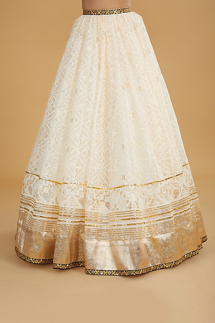 Ivory Modal Silk Gota Work Bridal Lehenga Set by Nitya Bajaj at Pernia's Pop Up Shop