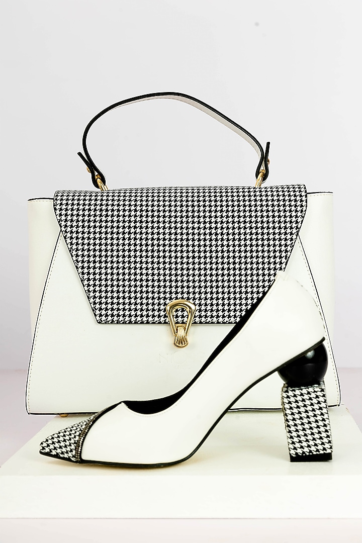 White & Black Art Leather Checkmate Handbag With Heels by Niche Label at Pernia's Pop Up Shop