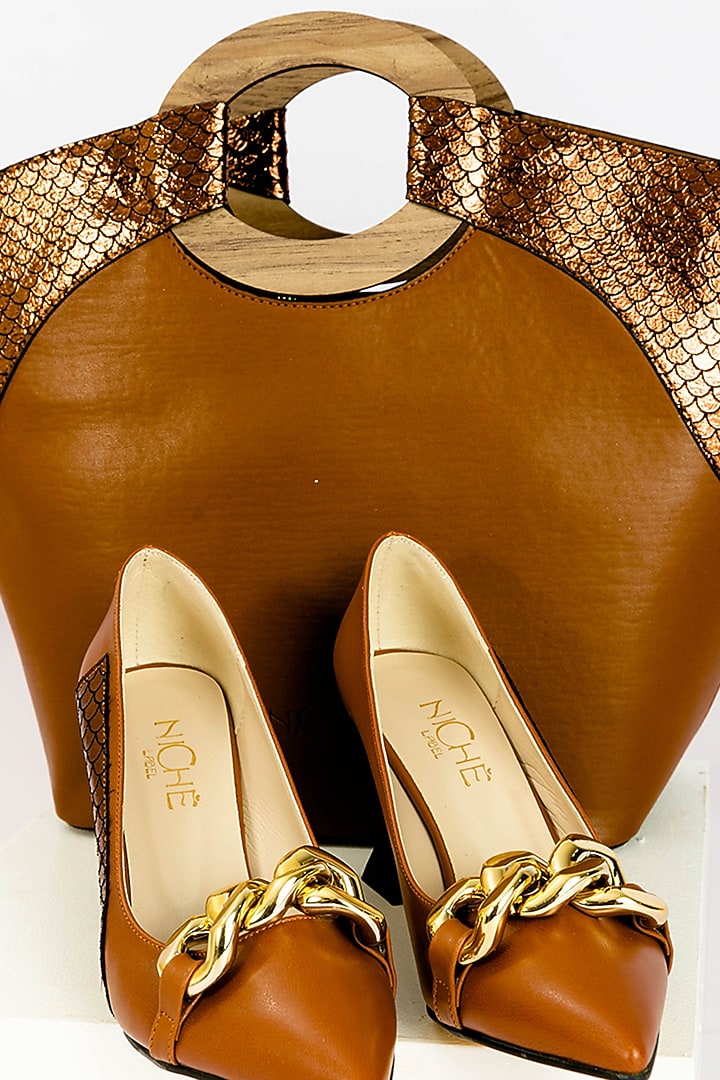 Brown Art Leather Sequins Embellished Handbag With Heels by Niche Label at Pernia's Pop Up Shop