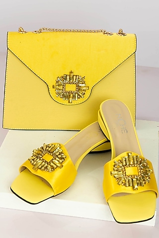Yellow Art Leather Stone Work Handbag With Heels by Niche Label