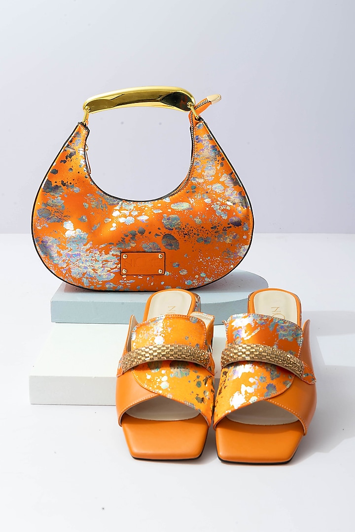 Orange Art Leather Sequins Embellished Handbag With Heels by Niche Label