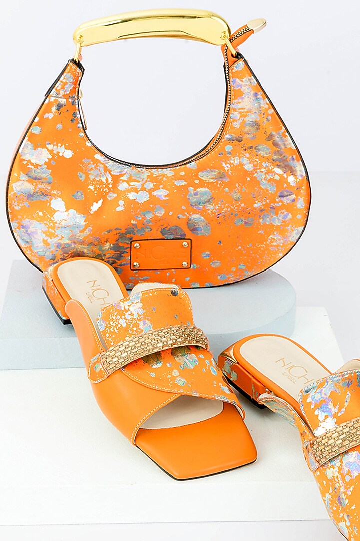Orange Art Leather Sequins Embellished Handbag With Heels by Niche Label at Pernia's Pop Up Shop