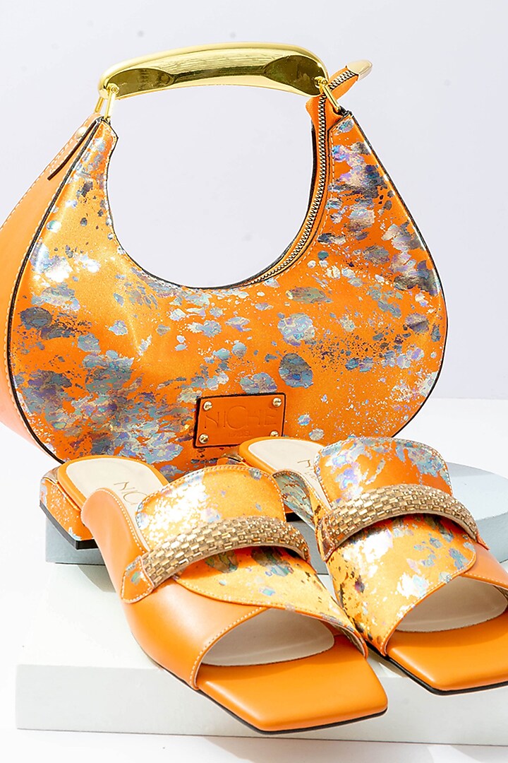 Orange Art Leather Sequins Embellished Handbag With Heels by Niche Label at Pernia's Pop Up Shop