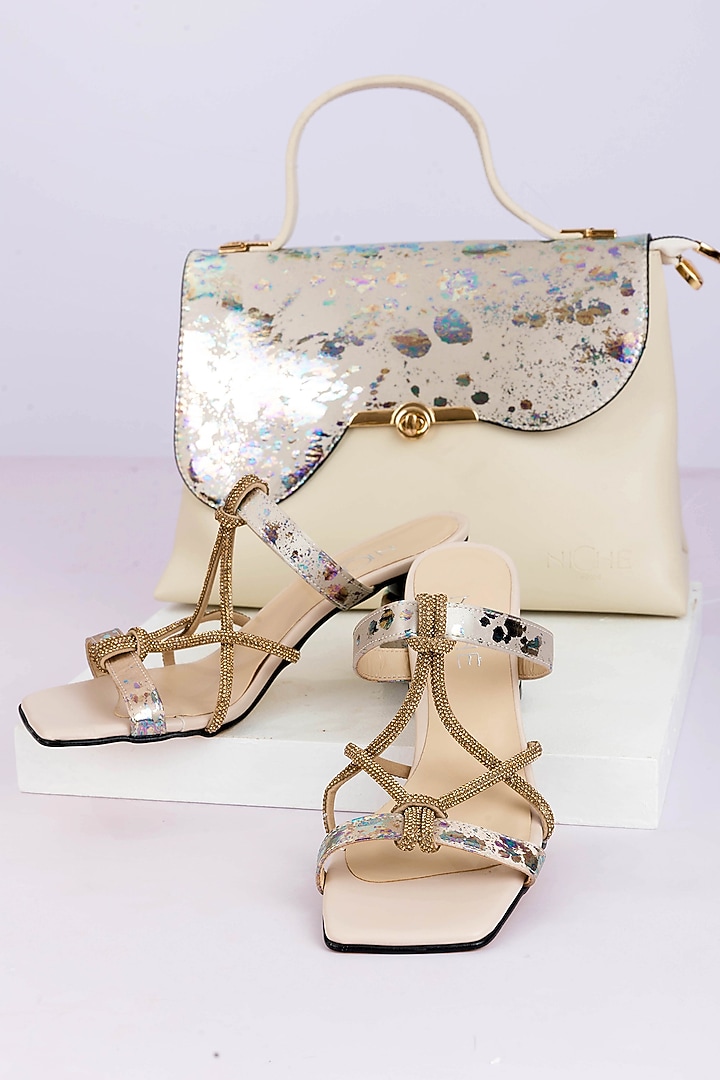 Cream Art Leather Sequins Embellished Handbag With Heels by Niche Label at Pernia's Pop Up Shop
