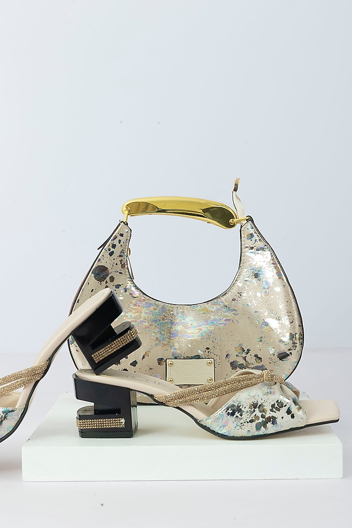 Ivory Fabric Sequins Embellished Handbag With Heels by Niche Label at Pernia's Pop Up Shop