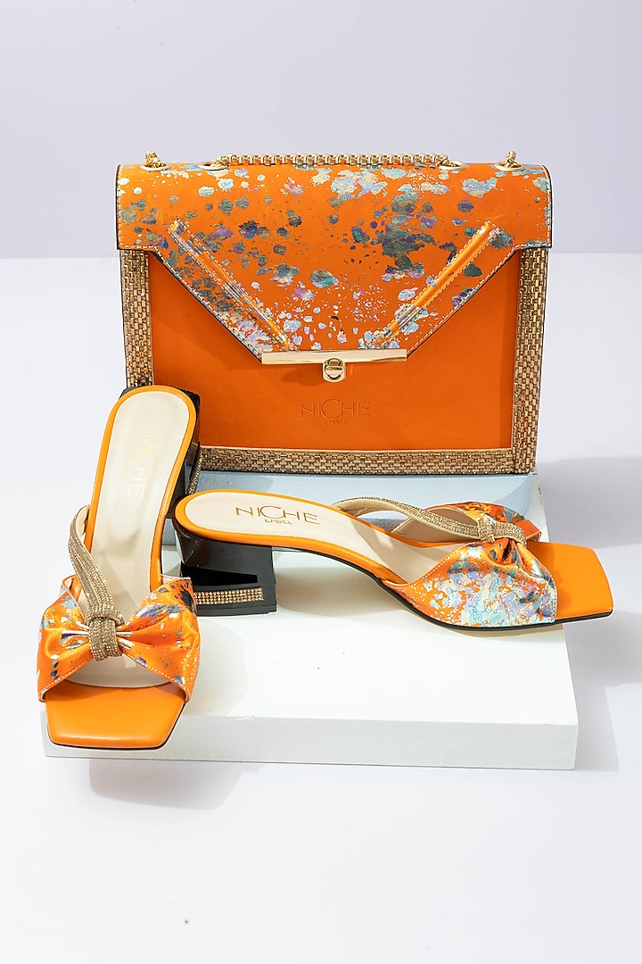 Orange Art Leather Sequins Embellished Envelope Handbag With Heels by Niche Label at Pernia's Pop Up Shop