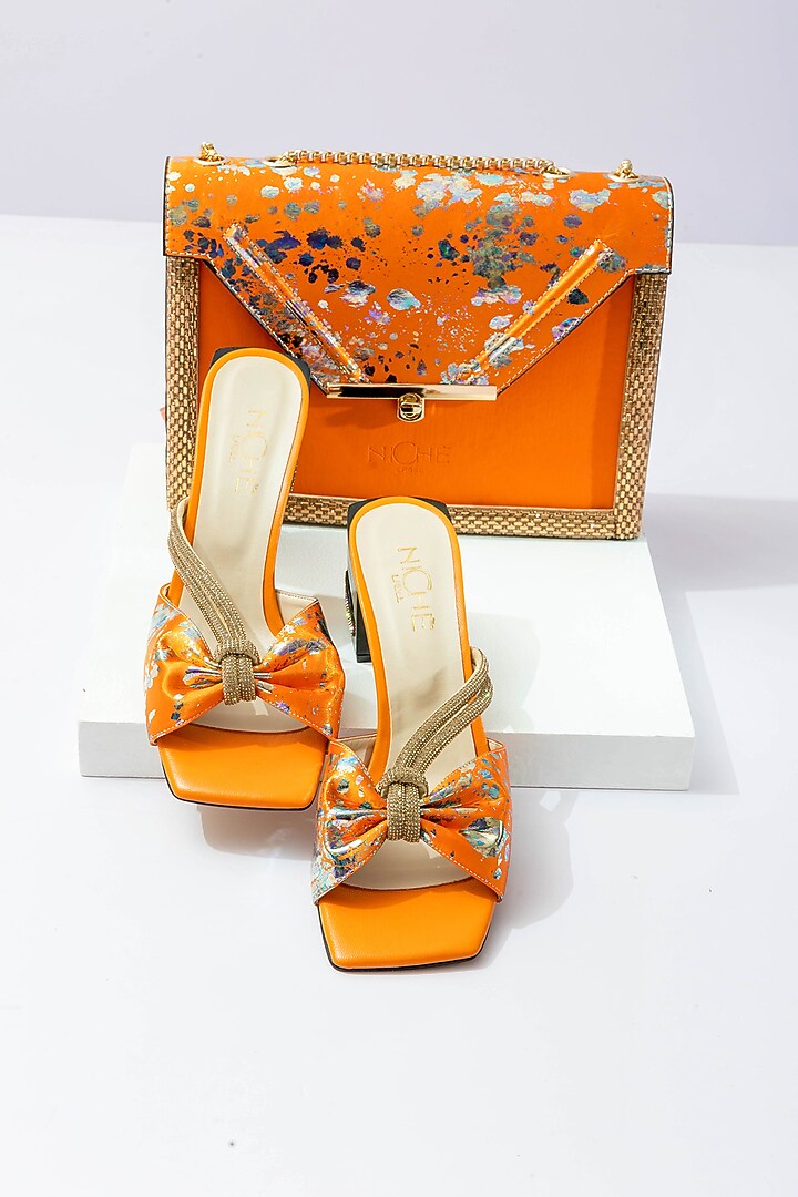 Orange Art Leather Sequins Embellished Envelope Handbag With Heels by Niche Label at Pernia's Pop Up Shop