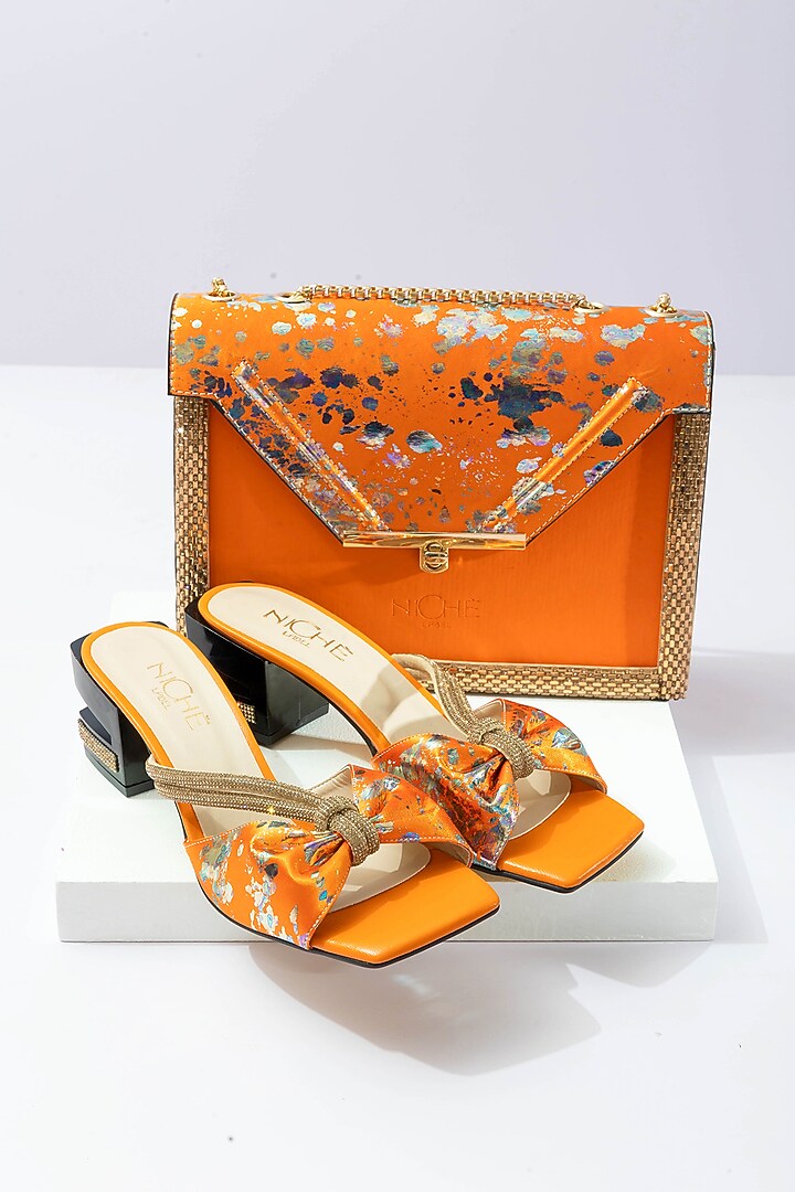 Orange Art Leather Sequins Embellished Envelope Handbag With Heels by Niche Label at Pernia's Pop Up Shop