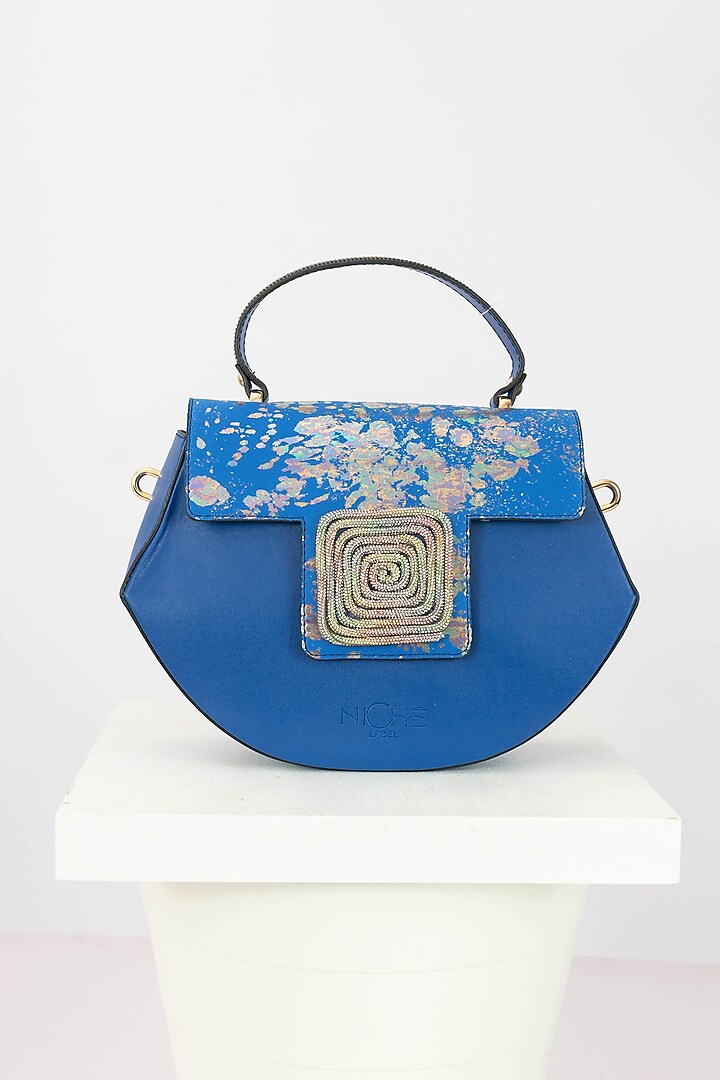 Blue Art Leather Sequinned Handbag by Niche Label