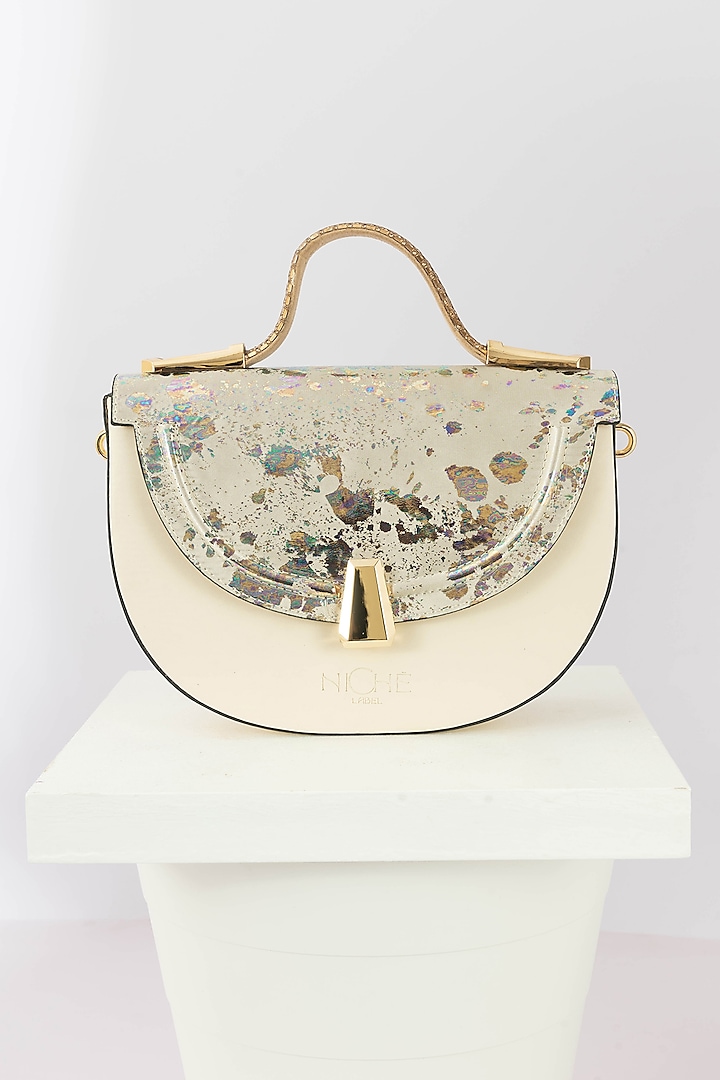 Cream Art Leather Sequinned Handbag by Niche Label
