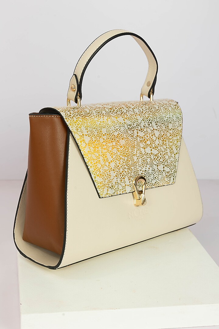 Cream Art Leather Sequinned Handbag by Niche Label at Pernia's Pop Up Shop