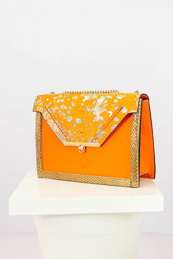 Orange Art Leather Sequinned Envelope Handbag by Niche Label