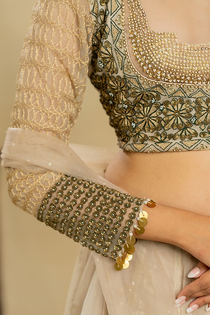 Ivory Foil Organza Hand Embroidered Bridal Lehenga by Nidhi Halani at Pernia's Pop Up Shop