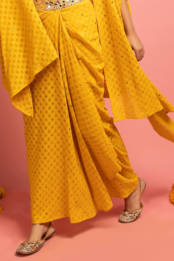 Mustard Yellow Draped Skirt Set With Cape by Nitara Dhanraj Label at Pernia's Pop Up Shop
