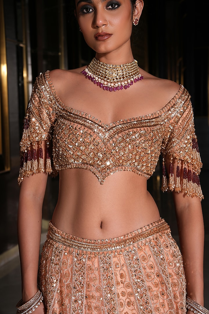 Golden Peach Net Hand Embroidered Wedding Lehenga Set by NIKUNJ BY NIIDHI BAJAJ at Pernia's Pop Up Shop