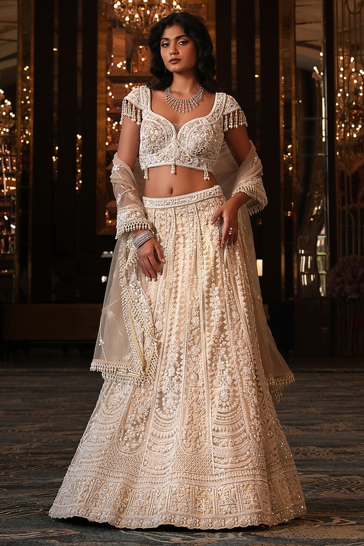 Off-White Net Hand Embroidered Wedding Lehenga Set by NIKUNJ BY NIIDHI BAJAJ at Pernia's Pop Up Shop