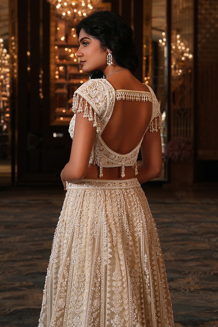 Off-White Net Hand Embroidered Wedding Lehenga Set by NIKUNJ BY NIIDHI BAJAJ at Pernia's Pop Up Shop
