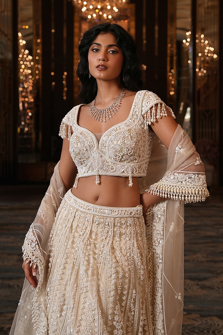 Off-White Net Hand Embroidered Wedding Lehenga Set by NIKUNJ BY NIIDHI BAJAJ at Pernia's Pop Up Shop