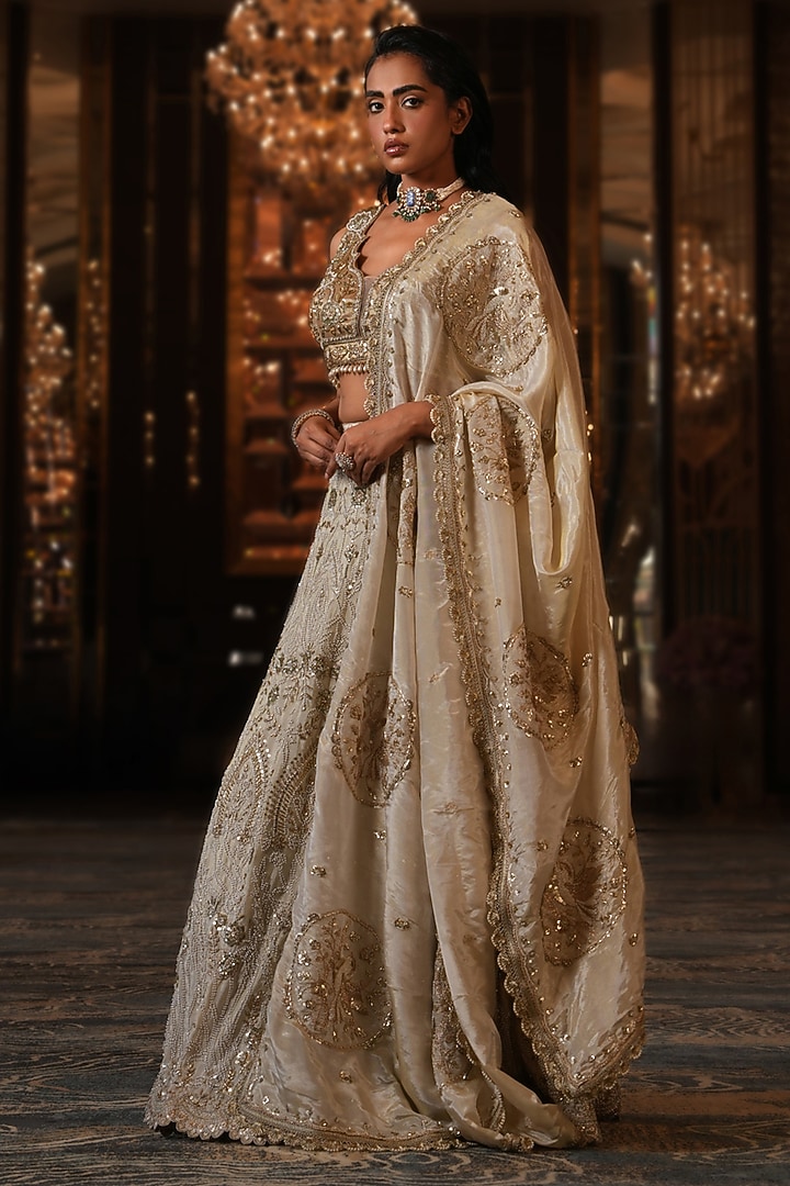 Off-White Net Hand Embroidered Wedding Lehenga Set by NIKUNJ BY NIIDHI BAJAJ at Pernia's Pop Up Shop