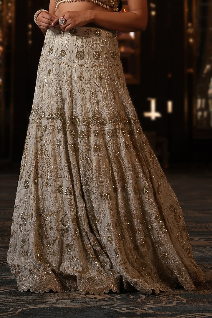 Off-White Net Hand Embroidered Wedding Lehenga Set by NIKUNJ BY NIIDHI BAJAJ at Pernia's Pop Up Shop