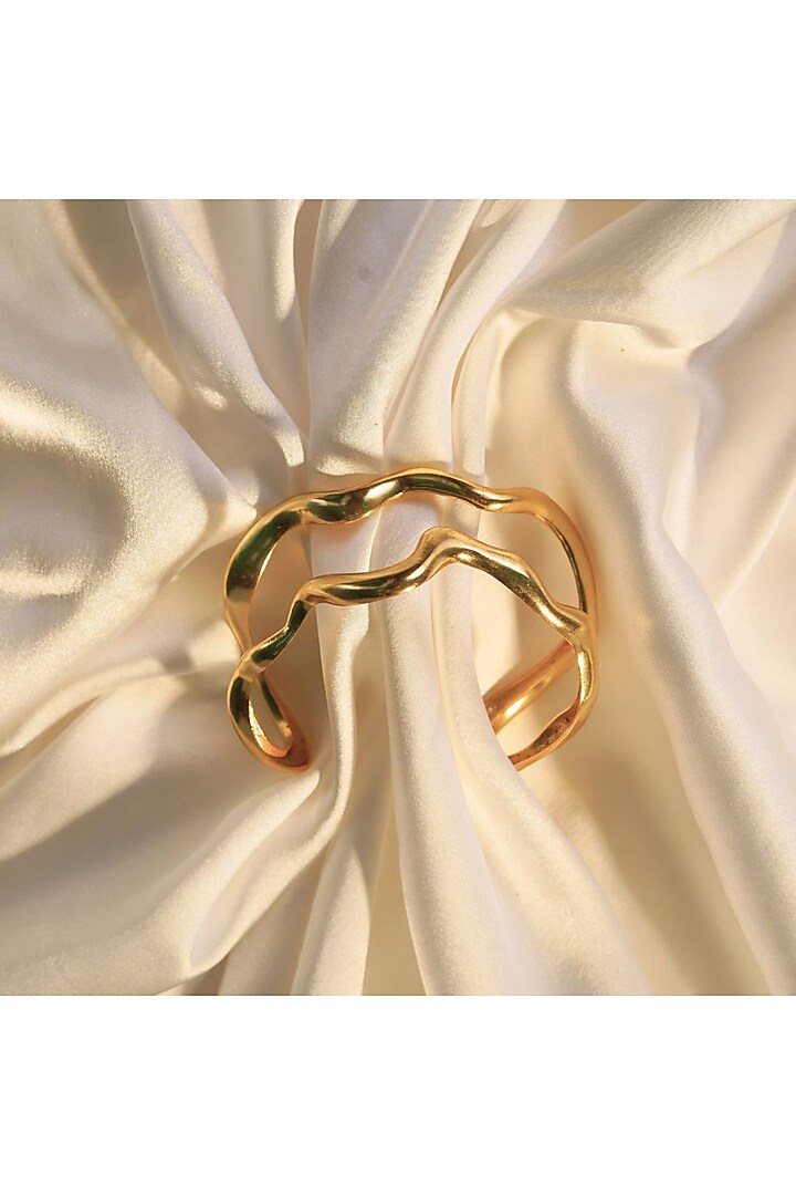 Gold Finish Handcrafted Ripple Handcuffs (Set Of 2) by NIHIRAA INDIA at Pernia's Pop Up Shop