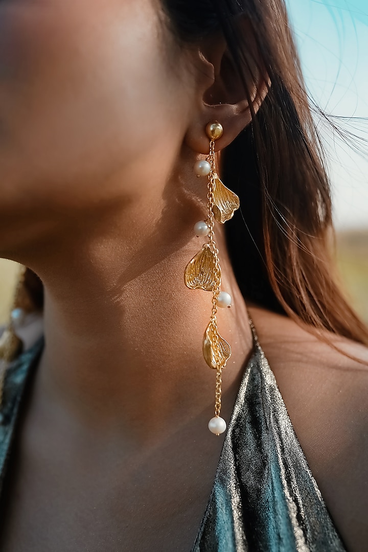 Gold Finish Pearl Handcrafted Dangler Earrings by NIHIRAA INDIA at Pernia's Pop Up Shop