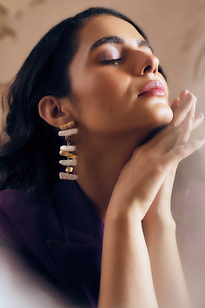 Gold Finish Pearl Handcrafted Dangler Earrings by NIHIRAA INDIA