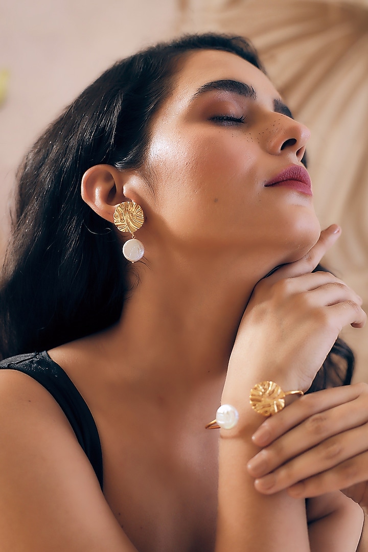 Gold Finish Pearl Handcrafted Dangler Earrings by NIHIRAA INDIA
