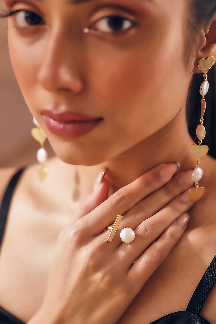 Gold Finish Pearl Handcrafted Ring by NIHIRAA INDIA