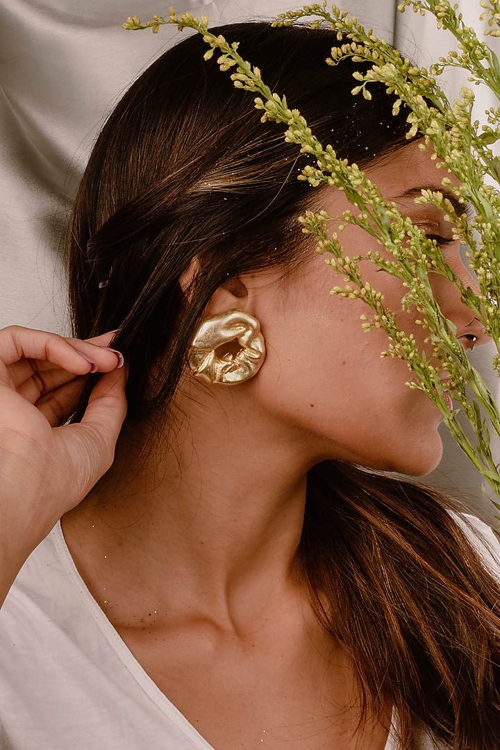 Gold Finish Handcrafted Stud Earrings by NIHIRAA INDIA