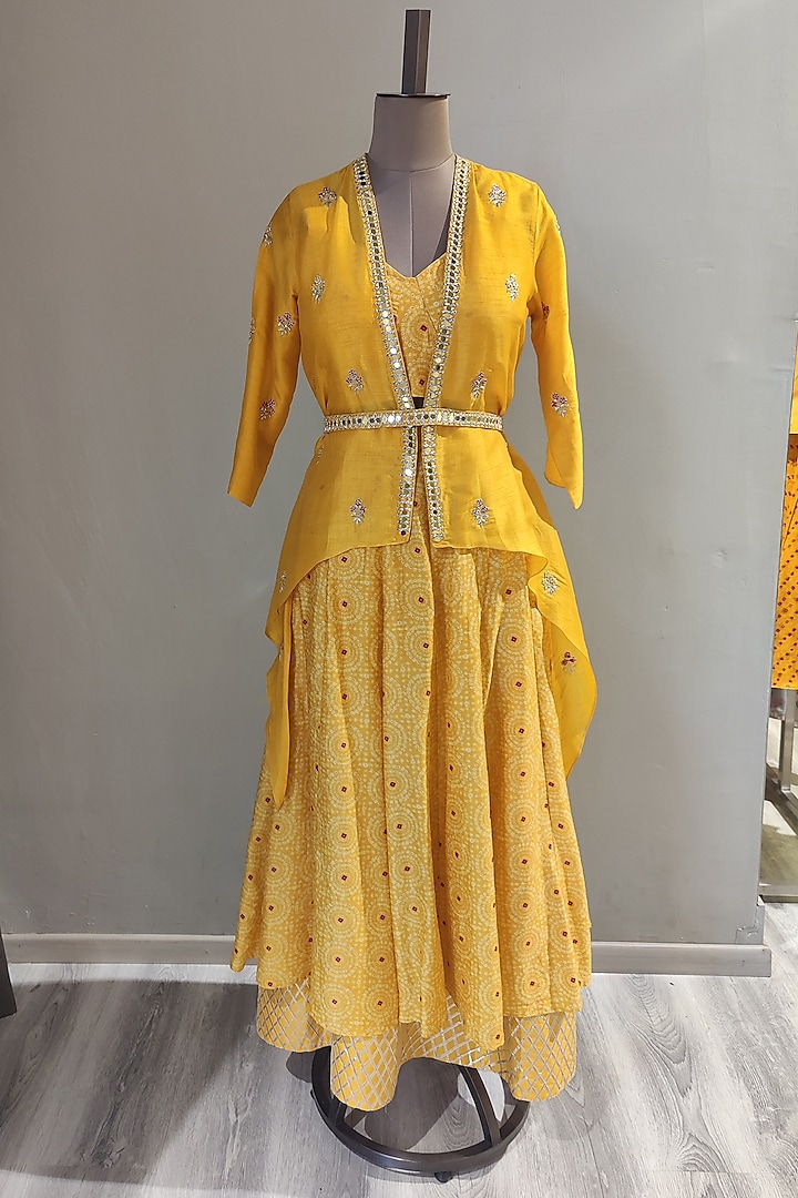Mustard Printed & Embroidered Skirt Set With Cape & Belt by Ne'Chi