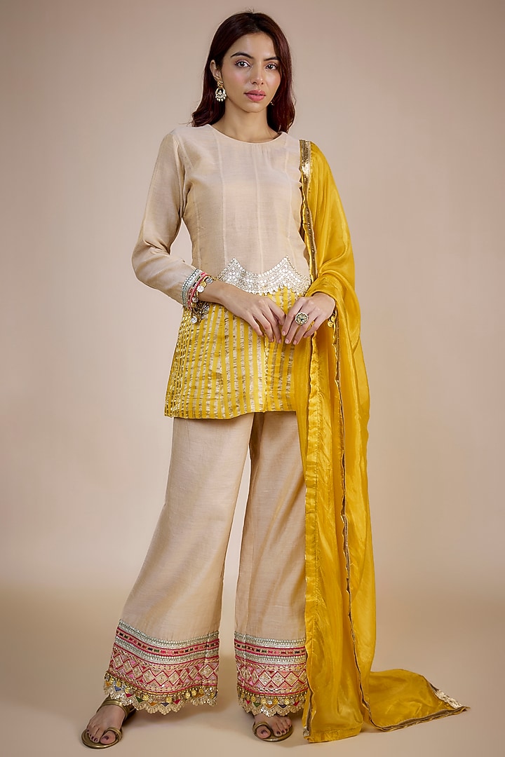 Beige Fine Chanderi Zari Embroidered Peplum Kurta Set by NE'CHI at Pernia's Pop Up Shop