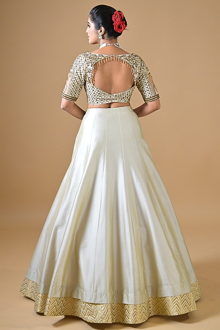 Off-White Imported Silk Cutdana Hand Embroidered Wedding Lehenga Set by Label Nilansha Jain at Pernia's Pop Up Shop