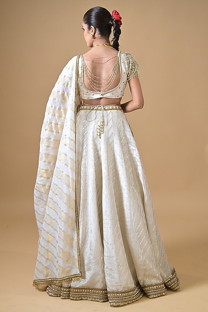 Off-White Banarasi Silk Cutdana Embroidered Wedding Lehenga Set by Label Nilansha Jain at Pernia's Pop Up Shop