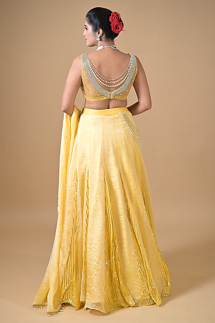 Yellow Imported Tissue Wedding Lehenga Set by Label Nilansha Jain at Pernia's Pop Up Shop