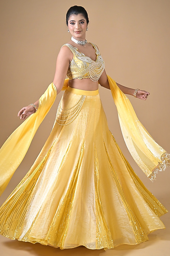 Yellow Imported Tissue Wedding Lehenga Set by Label Nilansha Jain at Pernia's Pop Up Shop