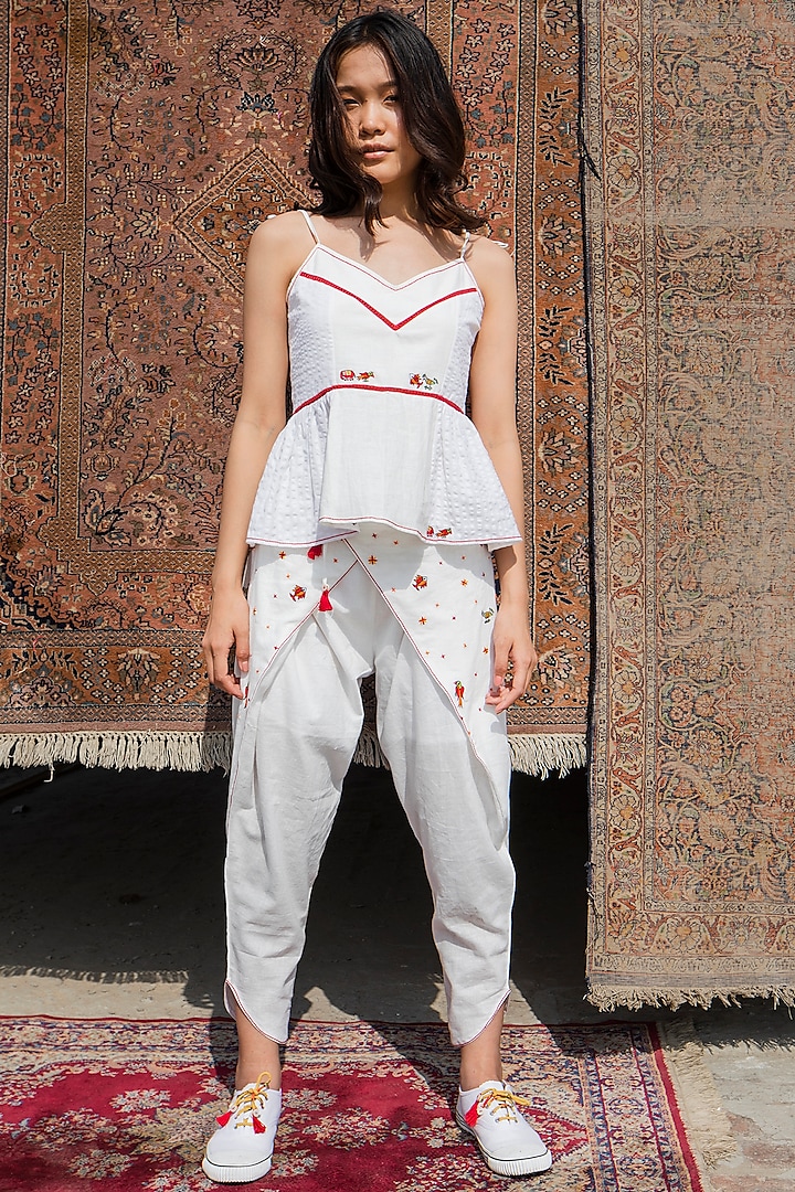 White Embroidered Wrap Pants With Tassels by Nika
