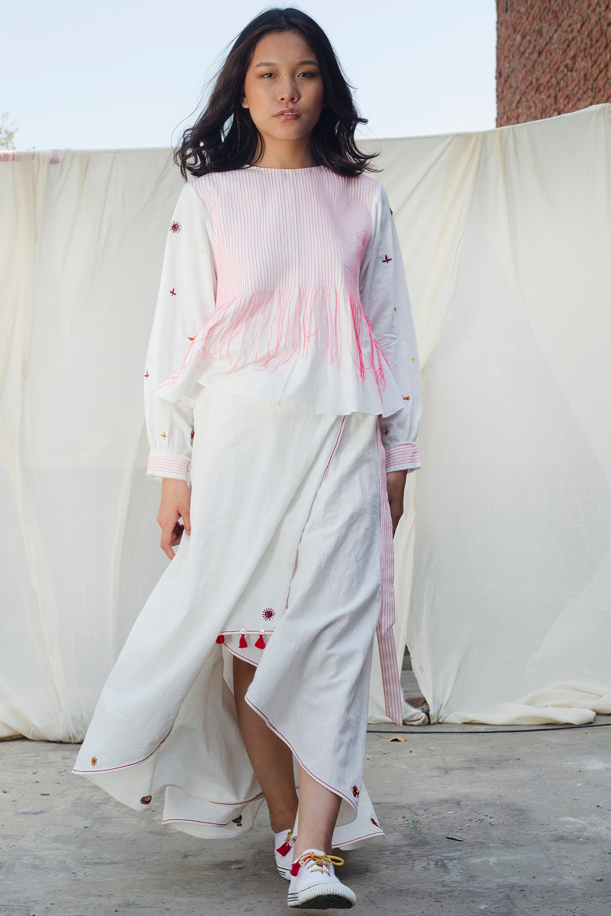 White Embroidered Wrap Skirt by Nika at Pernia s Pop Up Shop