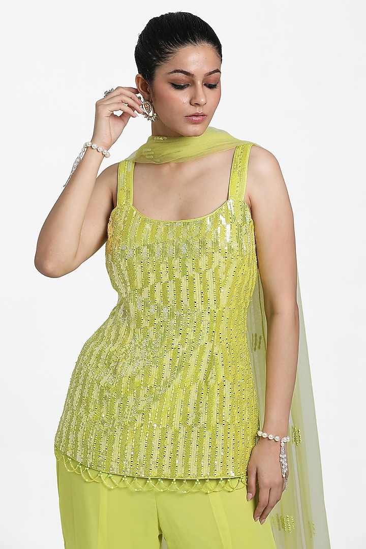 Neon Yellow Georgette Frilled Inserted Wedding Sharara Set by NITISHA  KASHYAP at Pernia's Pop Up Shop