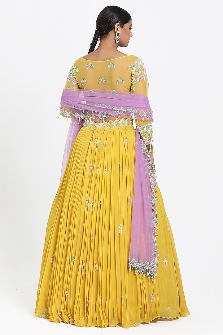 Yellow Georgette Bead & Cutdana Embroidered Wedding Lehenga Set by NITISHA KASHYAP at Pernia's Pop Up Shop
