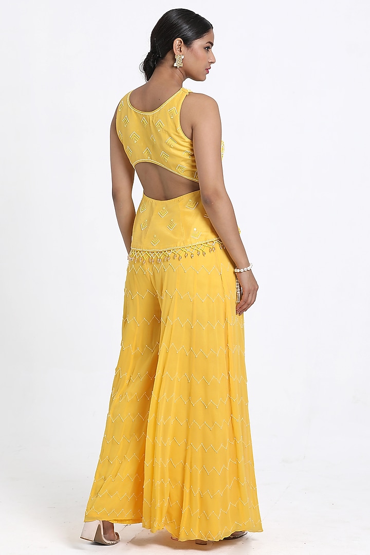 Yellow Georgette Inserted Wedding Sharara Set by NITISHA KASHYAP at Pernia's Pop Up Shop