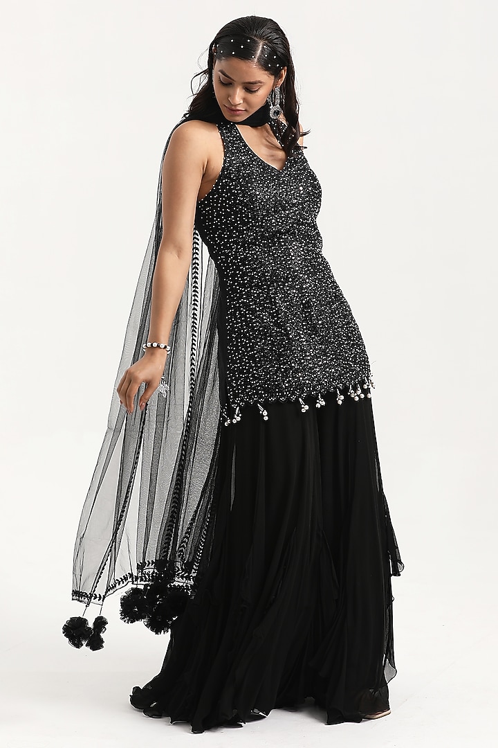 Black Georgette Frilled Inserted Wedding Sharara Set by NITISHA  KASHYAP at Pernia's Pop Up Shop